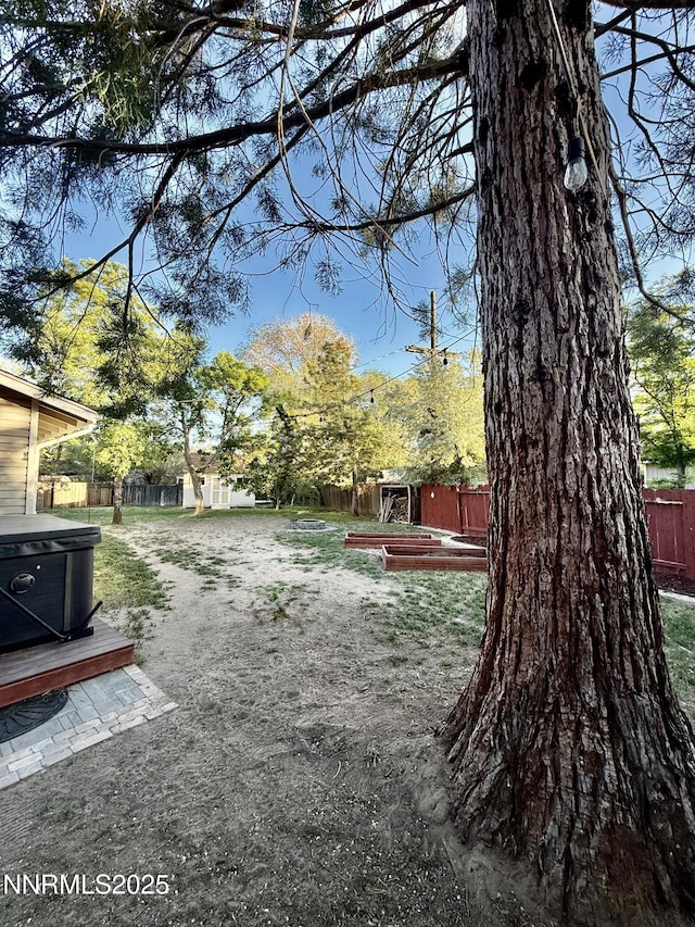 3100 Pine Ln, Carson City, NV 89706 - fenced backyard with a hot tub
