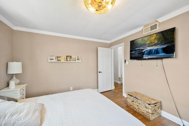 1712 Chaska Pl, Reno, NV 89502 - bedroom featuring crown molding, wood finished floors, and baseboards