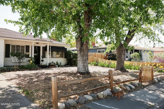 1712 Chaska Pl, Reno, NV 89502 - view of front facade with a fenced front yard and roof with shingles