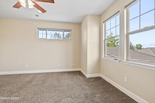 6638 Aston Cir, Sparks, NV 89436 - empty room with healthy amount of natural light, a ceiling fan, baseboards, and carpet floors