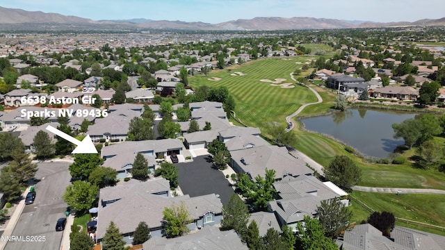 6638 Aston Cir, Sparks, NV 89436 - aerial view of property's location with nearby suburban area, a golf club, and a water and mountain view