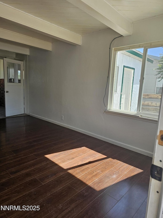 121 English St, Hawthorne, NV 89415 - spare room with beam ceiling, hardwood / wood-style floors, and baseboards