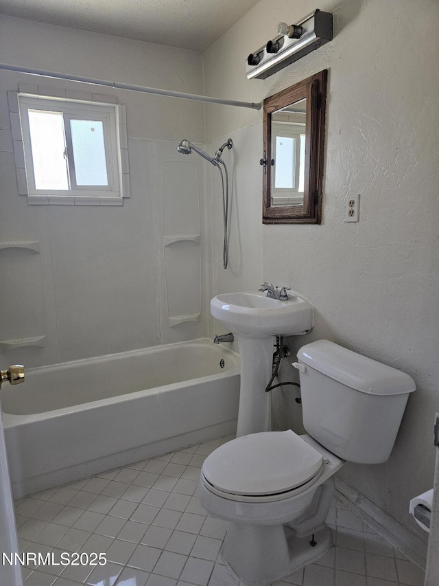 121 English St, Hawthorne, NV 89415 - bathroom featuring tub / shower combination, toilet, and tile patterned floors
