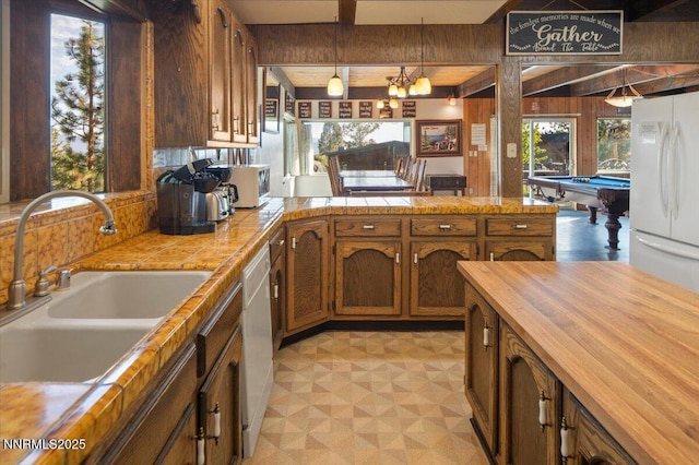 610 Don Dr, Zephyr Cove, NV 89448 - kitchen with white appliances, light floors, a sink, wooden counters, and pool table