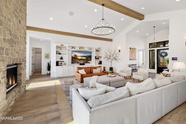 6300 Trailblazer Ct, Reno, NV 89511 - living room with a fireplace, high vaulted ceiling, beamed ceiling, recessed lighting, and light wood-style flooring