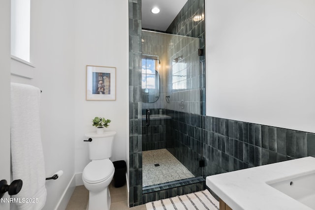 6300 Trailblazer Ct, Reno, NV 89511 - full bathroom with toilet, a stall shower, tile patterned flooring, baseboards, and vanity