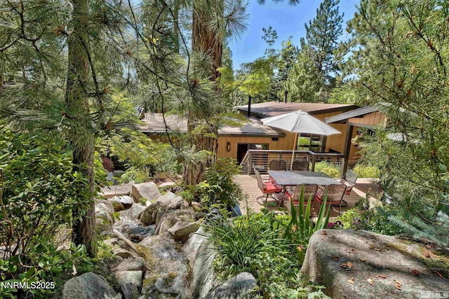 259 Mc Faul Ct, Zephyr Cove, NV 89448 - back of property with a deck and outdoor dining space