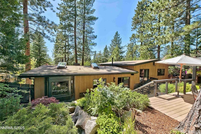 259 Mc Faul Ct, Zephyr Cove, NV 89448 - back of property with a wooden deck