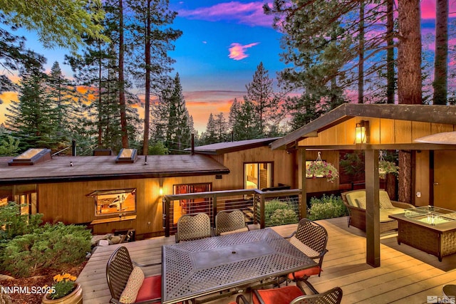 259 Mc Faul Ct, Zephyr Cove, NV 89448 - wooden deck featuring outdoor dining area and an outdoor living space with a fire pit