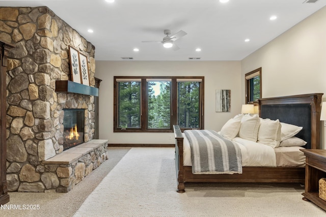 235 Timbercreek Ct, Reno, NV 89511 - bedroom with a fireplace, light colored carpet, recessed lighting, a ceiling fan, and baseboards