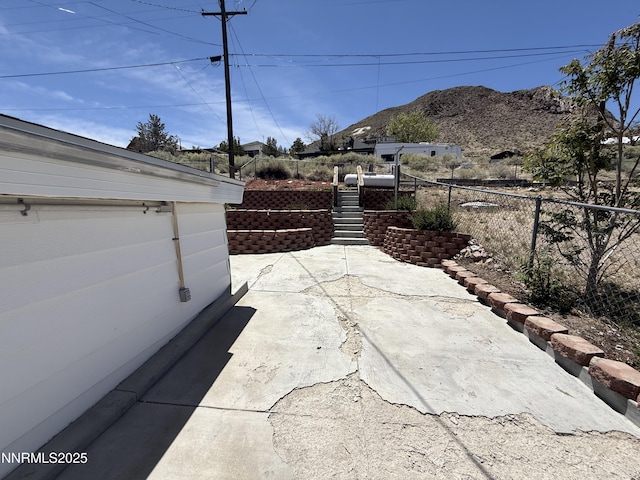 141 University St, Tonopah, NV 89049 - view of patio / terrace featuring a mountain view