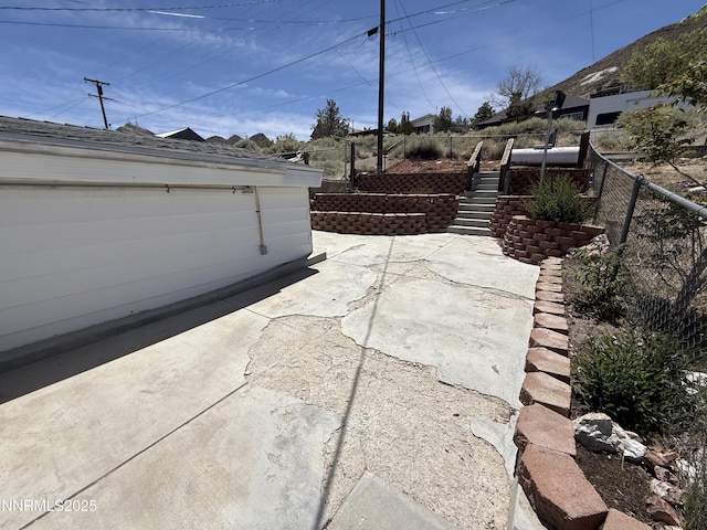 141 University St, Tonopah, NV 89049 - view of patio / terrace featuring stairs