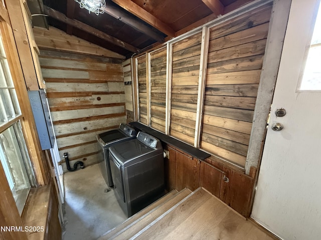 141 University St, Tonopah, NV 89049 - detailed view of washer and clothes dryer and wood walls