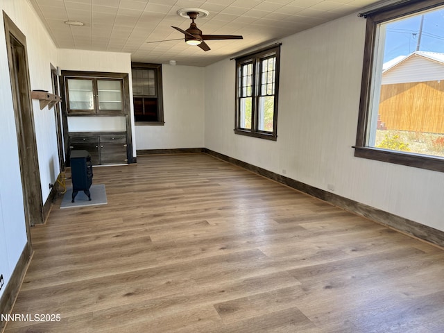 141 University St, Tonopah, NV 89049 - unfurnished room featuring wood finished floors, a ceiling fan, and baseboards