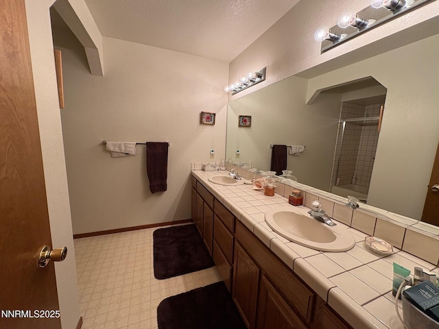 1885 Yale Dr, Carson City, NV 89703 - full bathroom featuring double vanity, tile patterned floors, and bathtub / shower combination