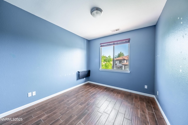 471 Shire Ct, Reno, NV 89521 - unfurnished room with wood finished floors and baseboards