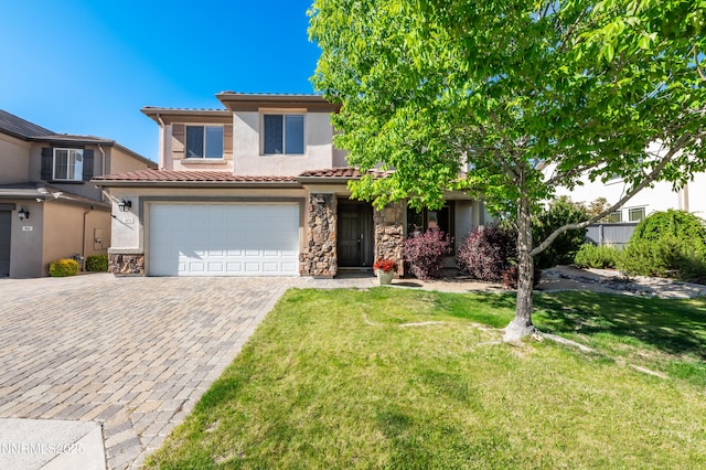 471 Shire Ct, Reno, NV 89521 - view of front of home with a tiled roof, stone siding, stucco siding, and a garage