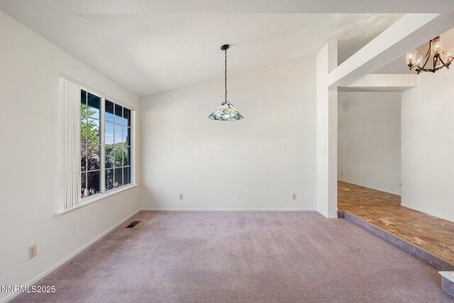 6649 Valley Wood Dr, Reno, NV 89523 - carpeted spare room with a chandelier, baseboards, and vaulted ceiling