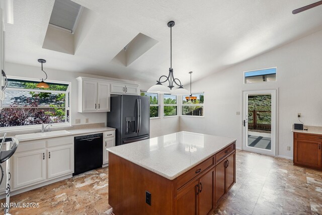 6649 Valley Wood Dr, Reno, NV 89523 - kitchen with black dishwasher, fridge with ice dispenser, a sink, lofted ceiling, and healthy amount of natural light