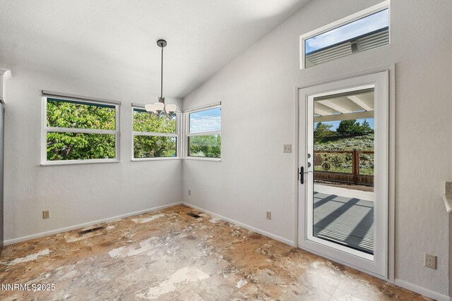 6649 Valley Wood Dr, Reno, NV 89523 - unfurnished dining area with baseboards, lofted ceiling, and a chandelier