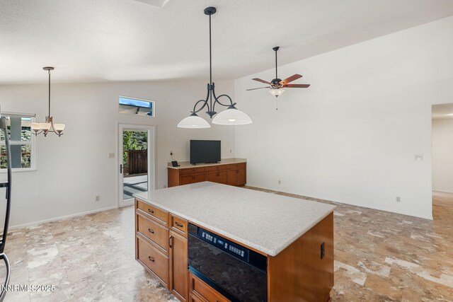 6649 Valley Wood Dr, Reno, NV 89523 - kitchen featuring brown cabinets, lofted ceiling, a ceiling fan, hanging light fixtures, and a kitchen island