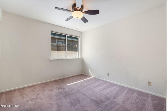 6649 Valley Wood Dr, Reno, NV 89523 - carpeted empty room with a ceiling fan and baseboards