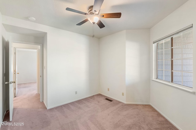6649 Valley Wood Dr, Reno, NV 89523 - empty room with light colored carpet, a ceiling fan, and baseboards