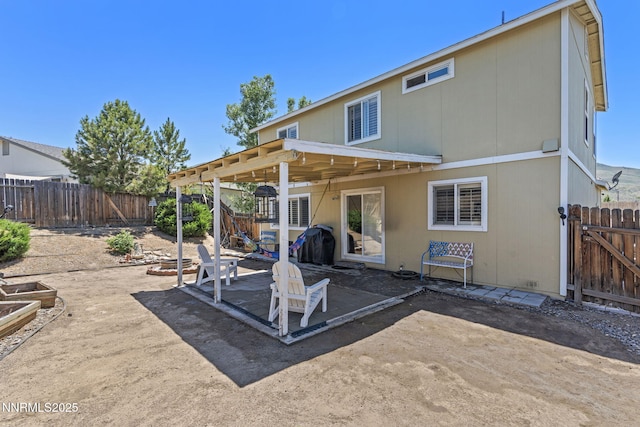 7991 Mariner Cove Dr, Reno, NV 89506 - back of house featuring a patio area and a fenced backyard