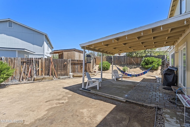 7991 Mariner Cove Dr, Reno, NV 89506 - fenced backyard with a patio area and area for grilling