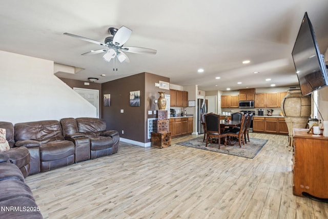 7991 Mariner Cove Dr, Reno, NV 89506 - living area with recessed lighting, ceiling fan, and light wood-style flooring