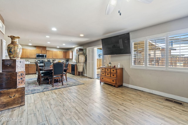 7991 Mariner Cove Dr, Reno, NV 89506 - dining space with light wood-type flooring, recessed lighting, and a ceiling fan