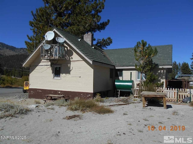 11000 Mount Rose Hwy, Reno, NV 89511 - view of property exterior with a chimney