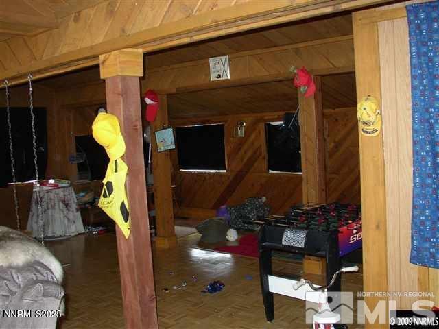 11000 Mount Rose Hwy, Reno, NV 89511 - below grade area featuring wooden walls