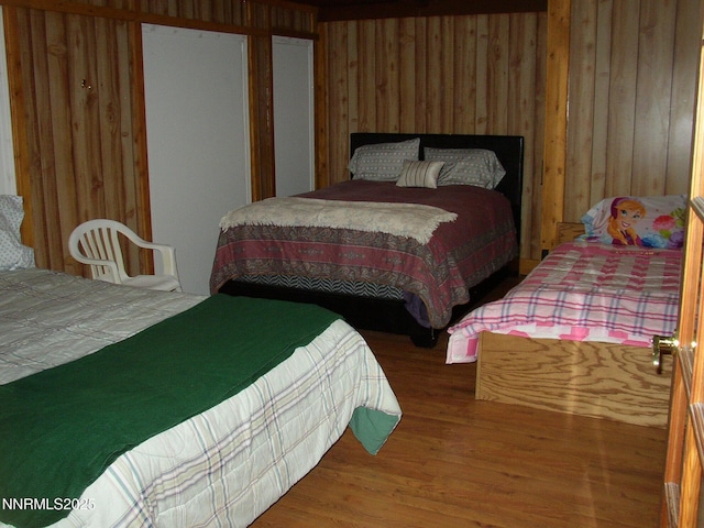 11000 Mount Rose Hwy, Reno, NV 89511 - bedroom with wood walls and wood finished floors