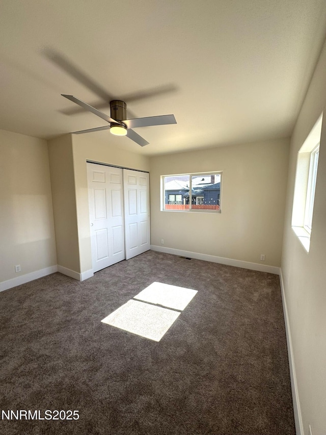 675 E Taylor St, Reno, NV 89502 - unfurnished bedroom featuring carpet, a closet, and baseboards