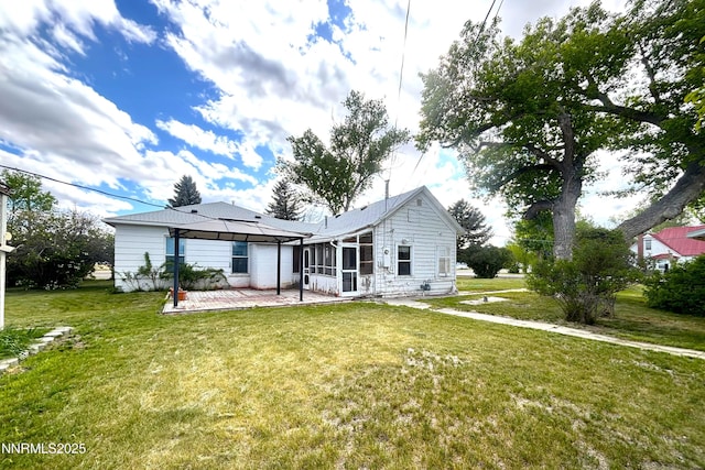 831 N 1st St, Battle Mountain, NV 89820 - rear view of property with a gazebo, a patio, and a yard
