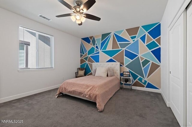 6127 Red Stable Rd, Sparks, NV 89436 - bedroom with baseboards, carpet, an accent wall, and ceiling fan