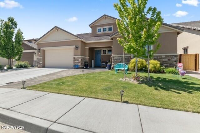 6127 Red Stable Rd, Sparks, NV 89436 - view of front of house featuring stone siding, driveway, a garage, and stucco siding