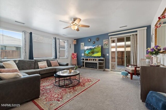 6127 Red Stable Rd, Sparks, NV 89436 - carpeted living area with plenty of natural light and a ceiling fan