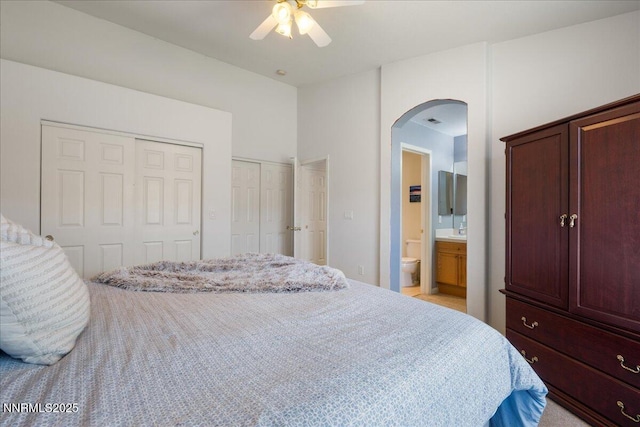 1835 Stoneridge Dr, Verdi, NV 89439 - bedroom with arched walkways, two closets, ensuite bath, and a ceiling fan