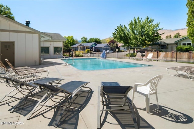 1835 Stoneridge Dr, Verdi, NV 89439 - community pool featuring a patio area and a mountain view