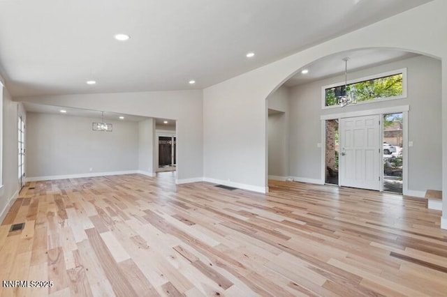 2080 Del Rio Ln, Reno, NV 89509 - foyer entrance featuring arched walkways, light wood-style flooring, recessed lighting, and baseboards