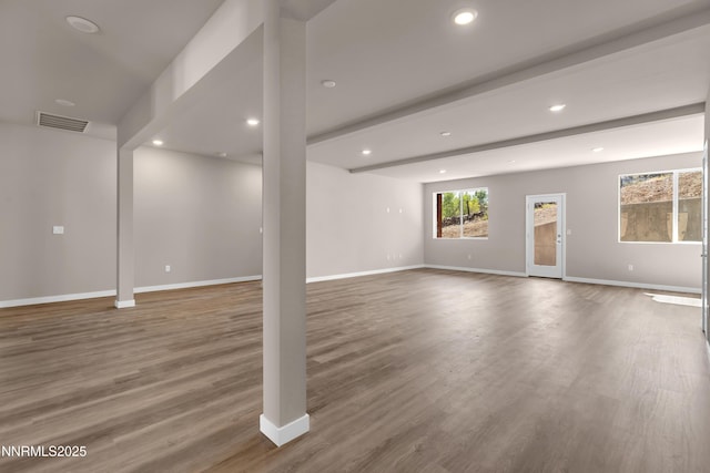 1466 Copper Point Cir, Reno, NV 89519 - unfurnished living room featuring recessed lighting, wood finished floors, baseboards, and beam ceiling