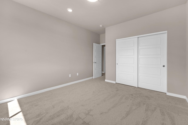 1466 Copper Point Cir, Reno, NV 89519 - unfurnished bedroom featuring carpet, baseboards, and a closet