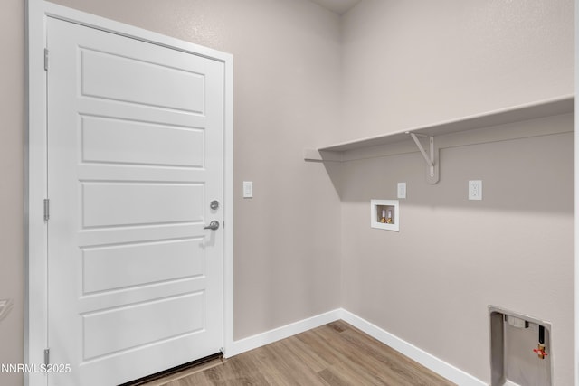 1466 Copper Point Cir, Reno, NV 89519 - washroom with hookup for a washing machine, wood finished floors, and baseboards