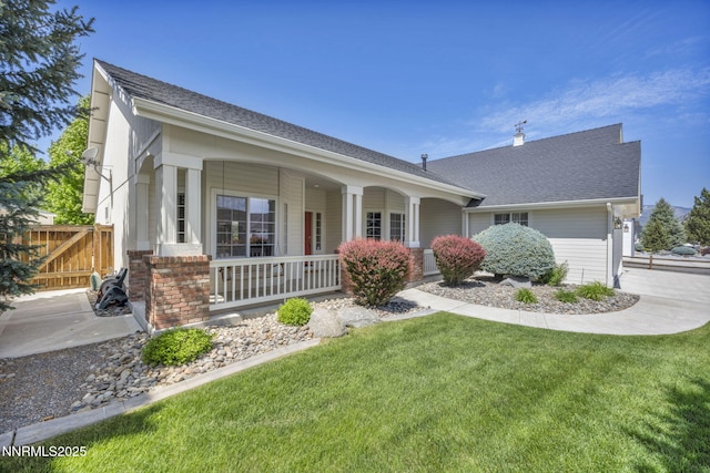 2866 La Cresta Cir, Minden, NV 89423 - ranch-style home featuring a porch, a shingled roof, and an attached garage