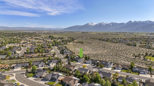 2866 La Cresta Cir, Minden, NV 89423 - aerial view of property's location featuring a mountainous background and nearby suburban area