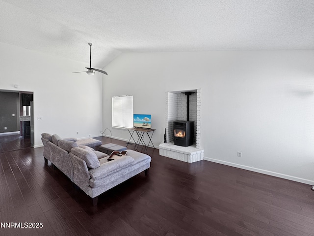 620 W National Ave, Winnemucca, NV 89445 - living area with lofted ceiling, wood finished floors, baseboards, ceiling fan, and a textured ceiling