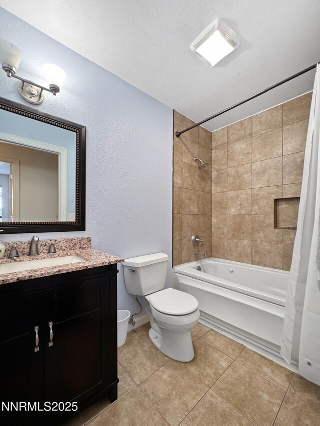 620 W National Ave, Winnemucca, NV 89445 - bathroom with toilet, shower / tub combo with curtain, vanity, tile patterned flooring, and a textured wall