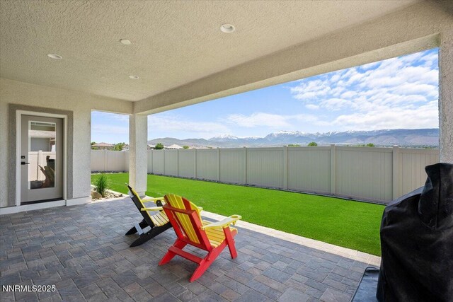 11235 Freedom Range Ln, Reno, NV 89521 - view of patio / terrace with a mountain view